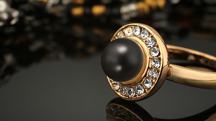 The Enigmatic Allure: Exploring the History and Significance of Black Pearl Rings