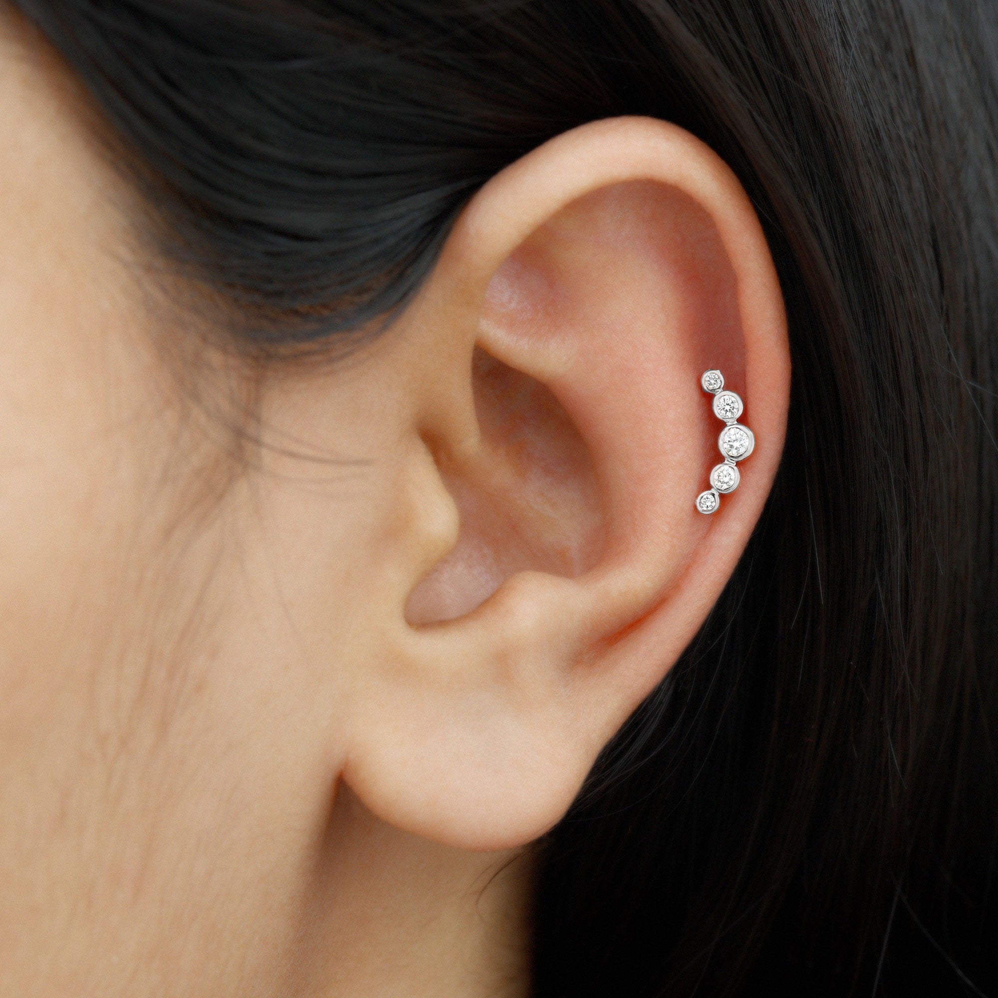 Bezel Set Moissanite Curved Helix Earring in Graduated Style D-VS1 - Rosec Jewels