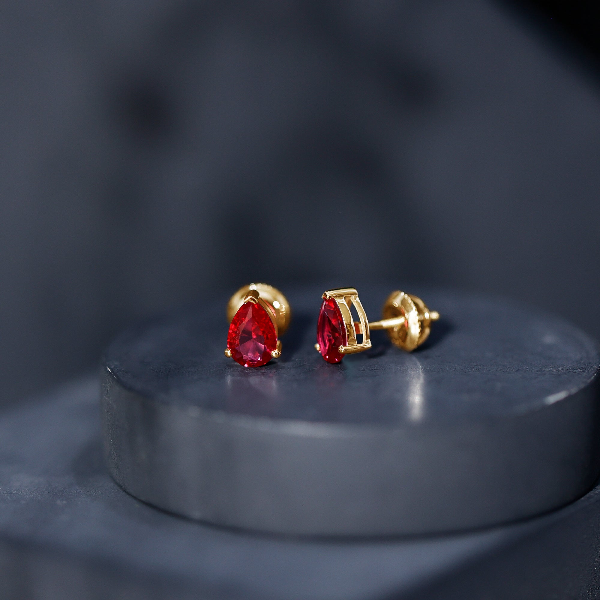 Solitaire 1.5 Carat Pear Shaped Lab Created Ruby Stud Earrings AAAA - Rosec Jewels