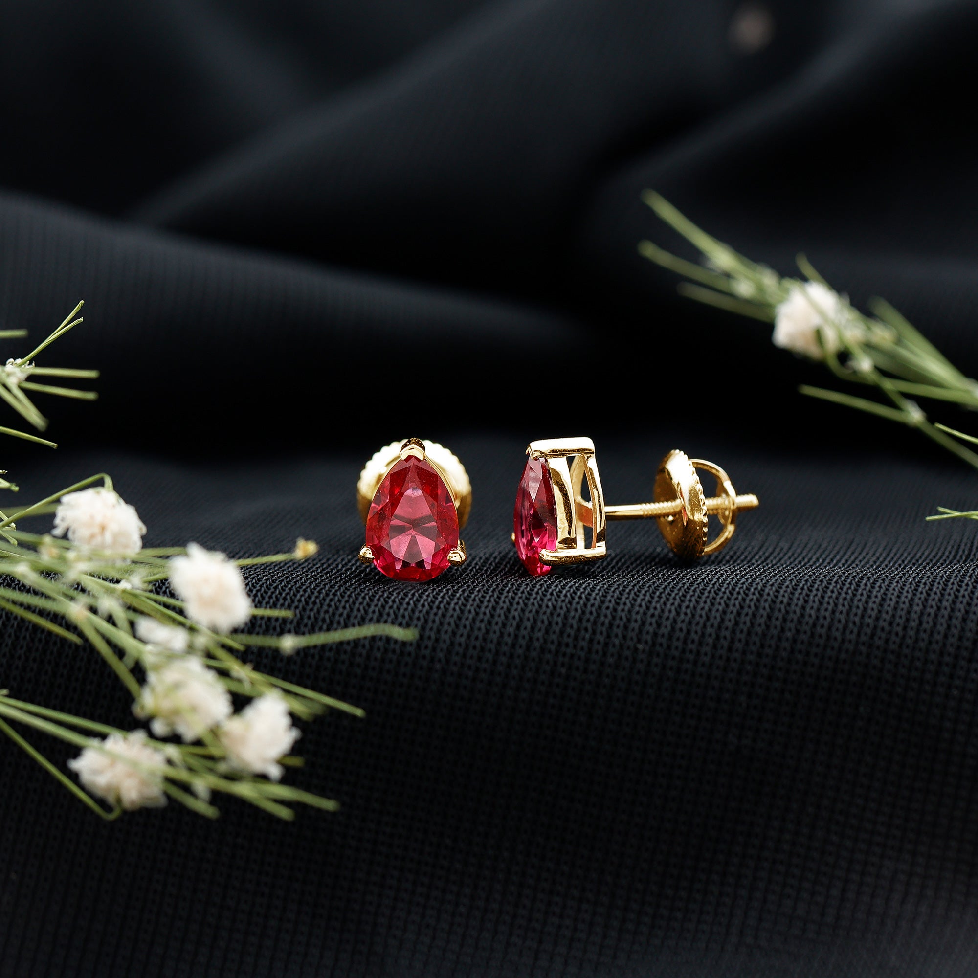 Solitaire 1.5 Carat Pear Shaped Lab Created Ruby Stud Earrings AAAA - Rosec Jewels