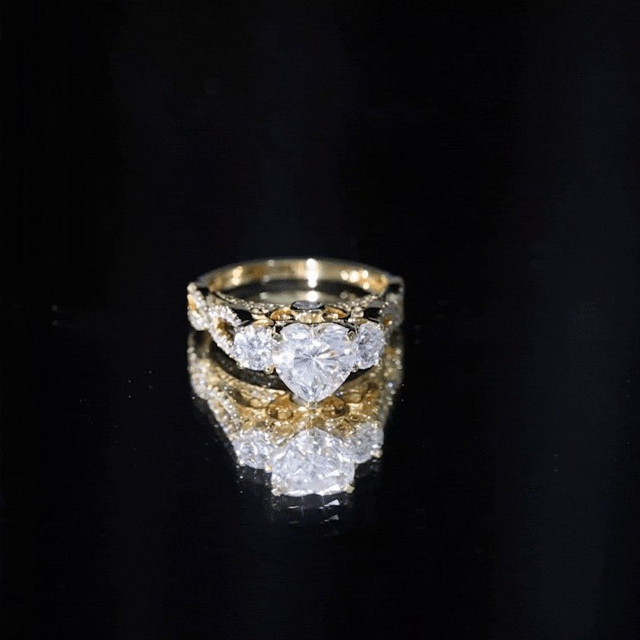 Rosec Jewels-1.5 Carat Heart Moissanite 3 Stone Engagement Ring in Crossover Band