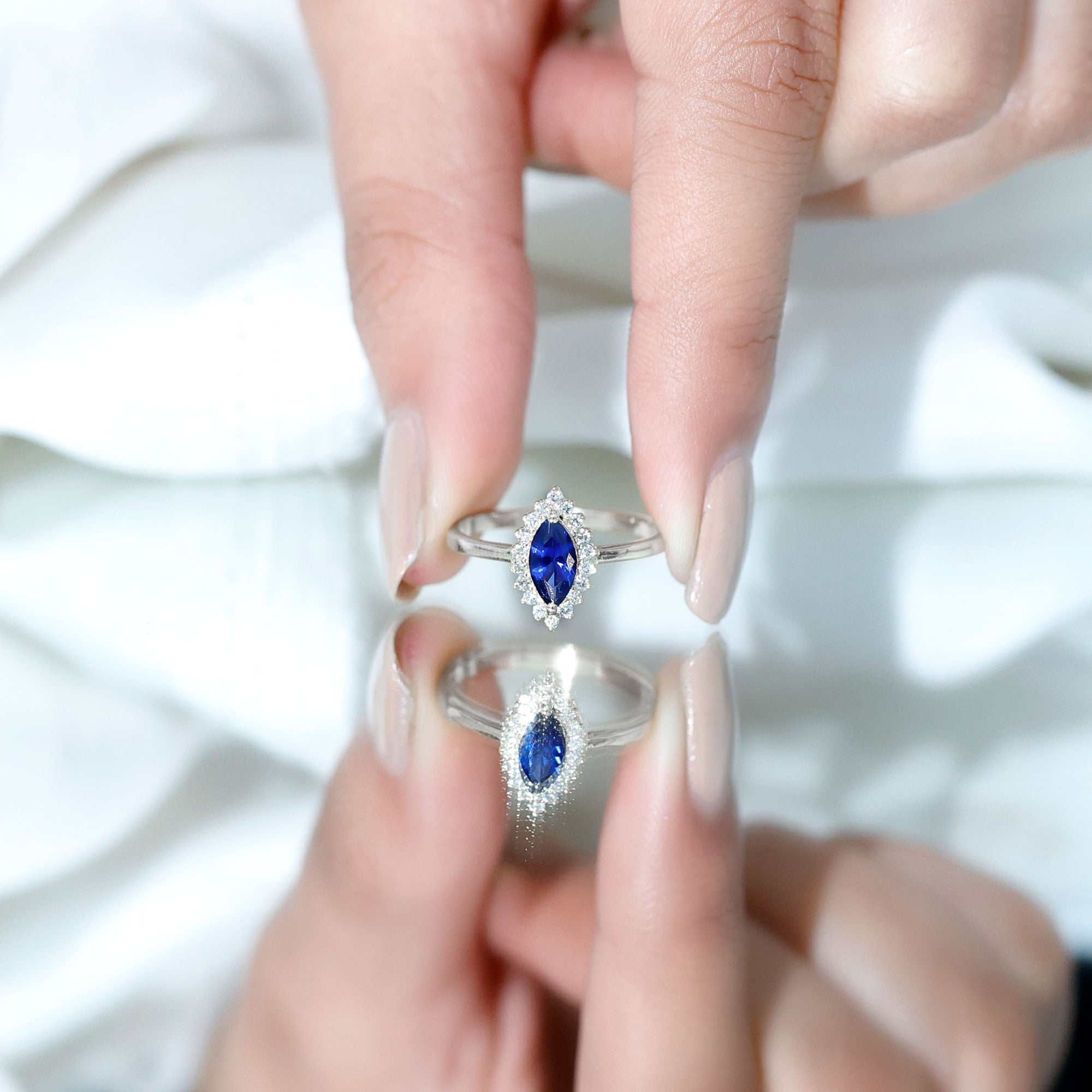 Rosec Jewels-Marquise Cut Lab Grown Blue Sapphire and Diamond Halo Engagement Ring