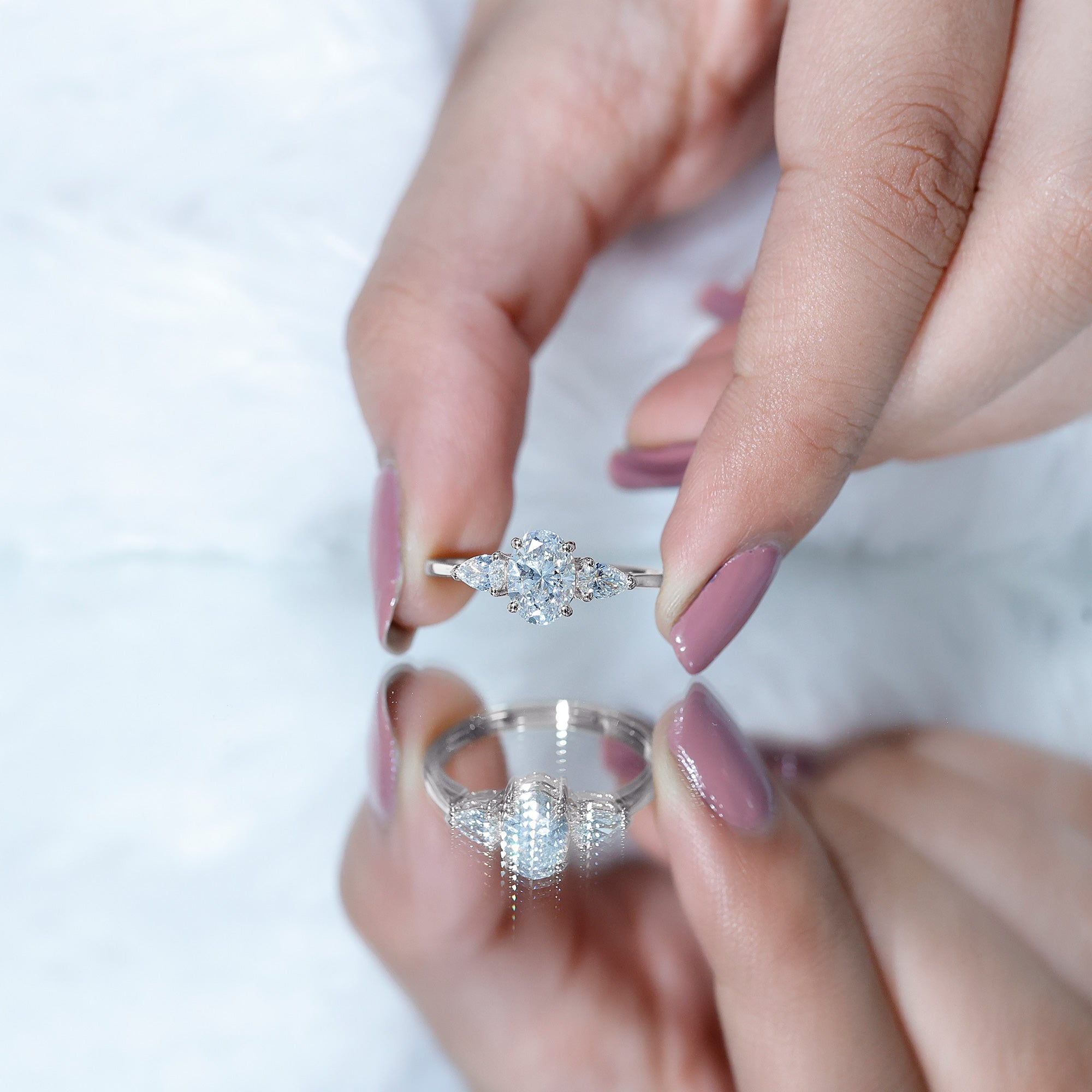 Rosec Jewels-Oval and Pear Cut Moissanite Three Stone Engagement Ring