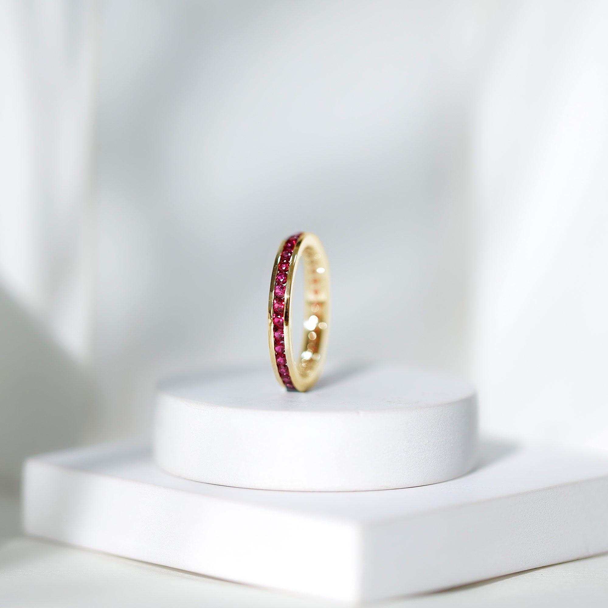 Channel Set Round Lab Created Ruby Eternity Band Ring for Women AAAA - Rosec Jewels