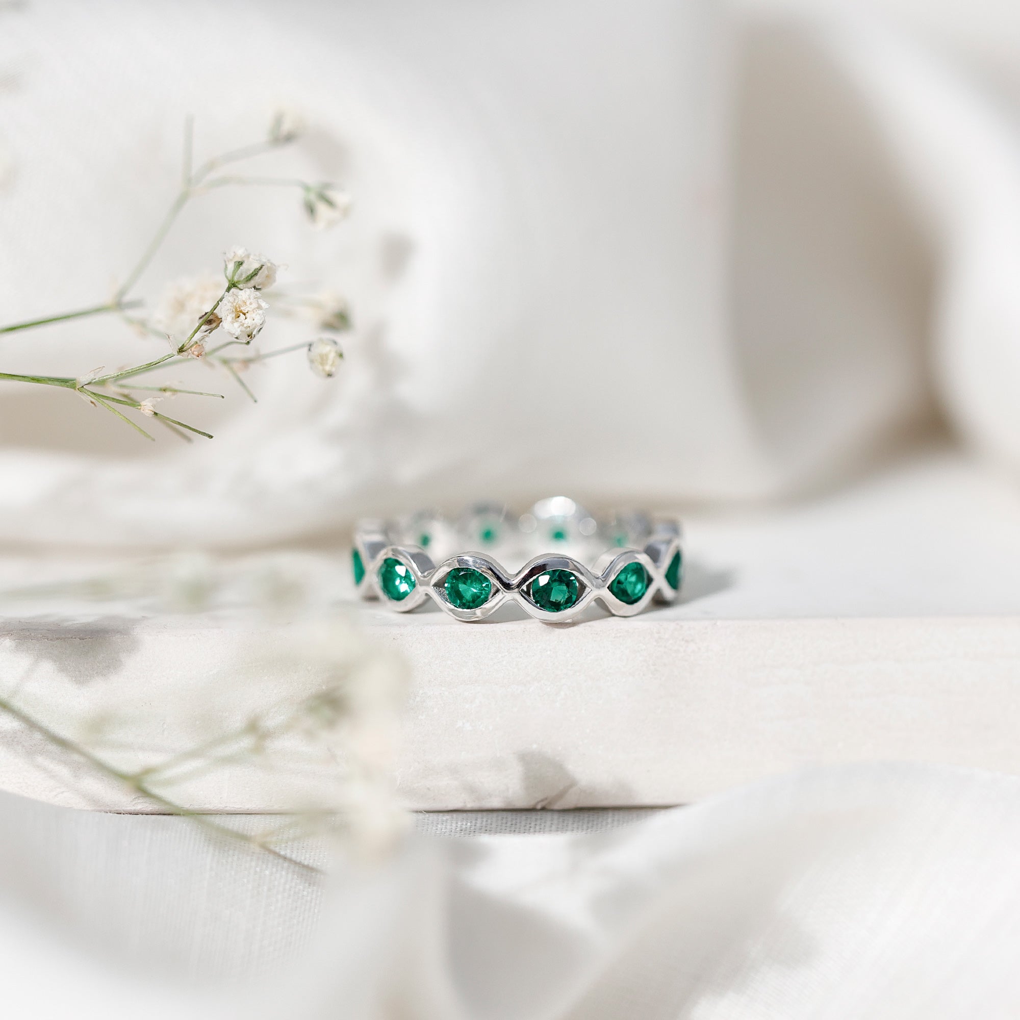 Certified Lab Grown Emerald Infinity Twisted Eternity Ring AAAA - Rosec Jewels