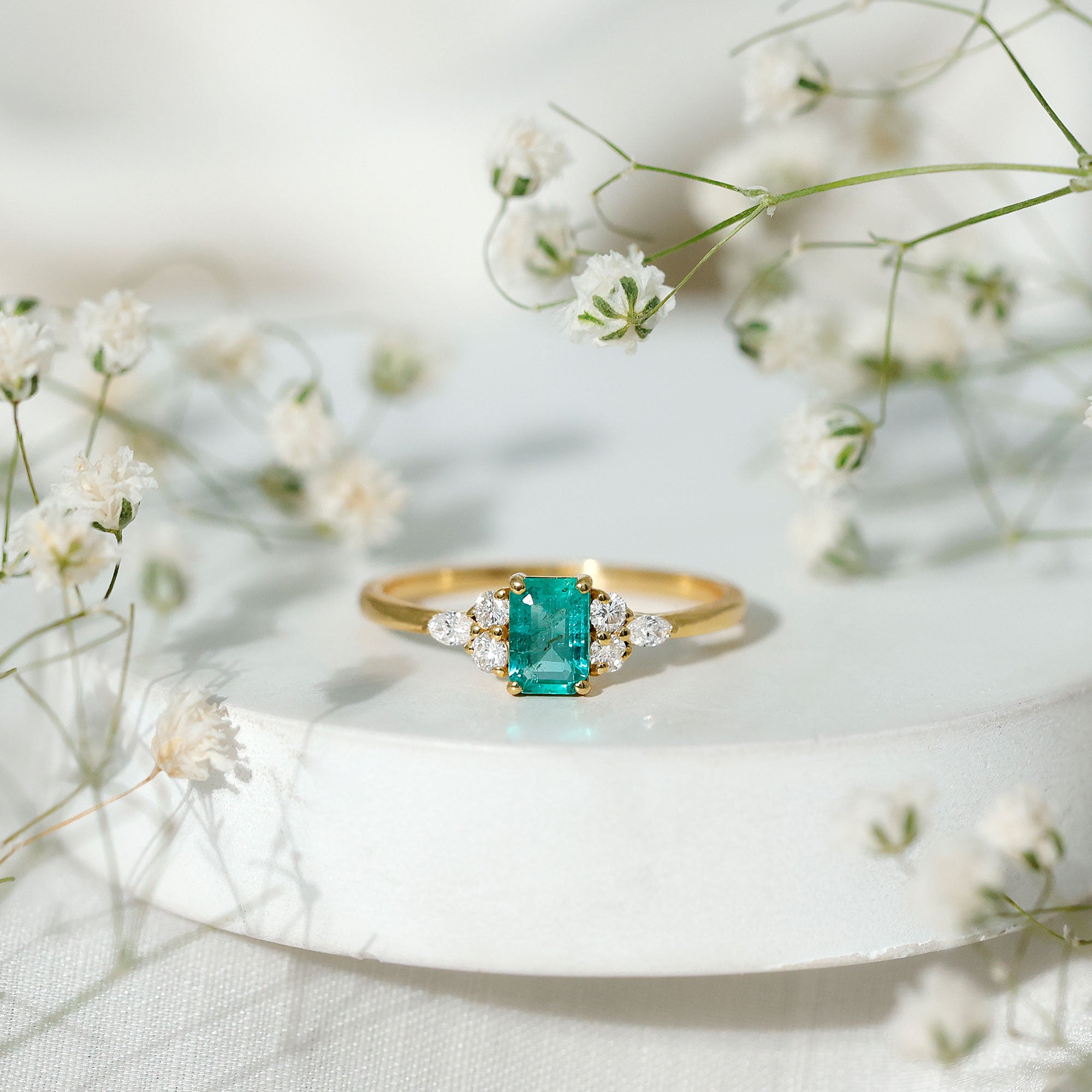 Rosec Jewels-Emerald Cut Emerald Engagement Ring with Diamond Trio