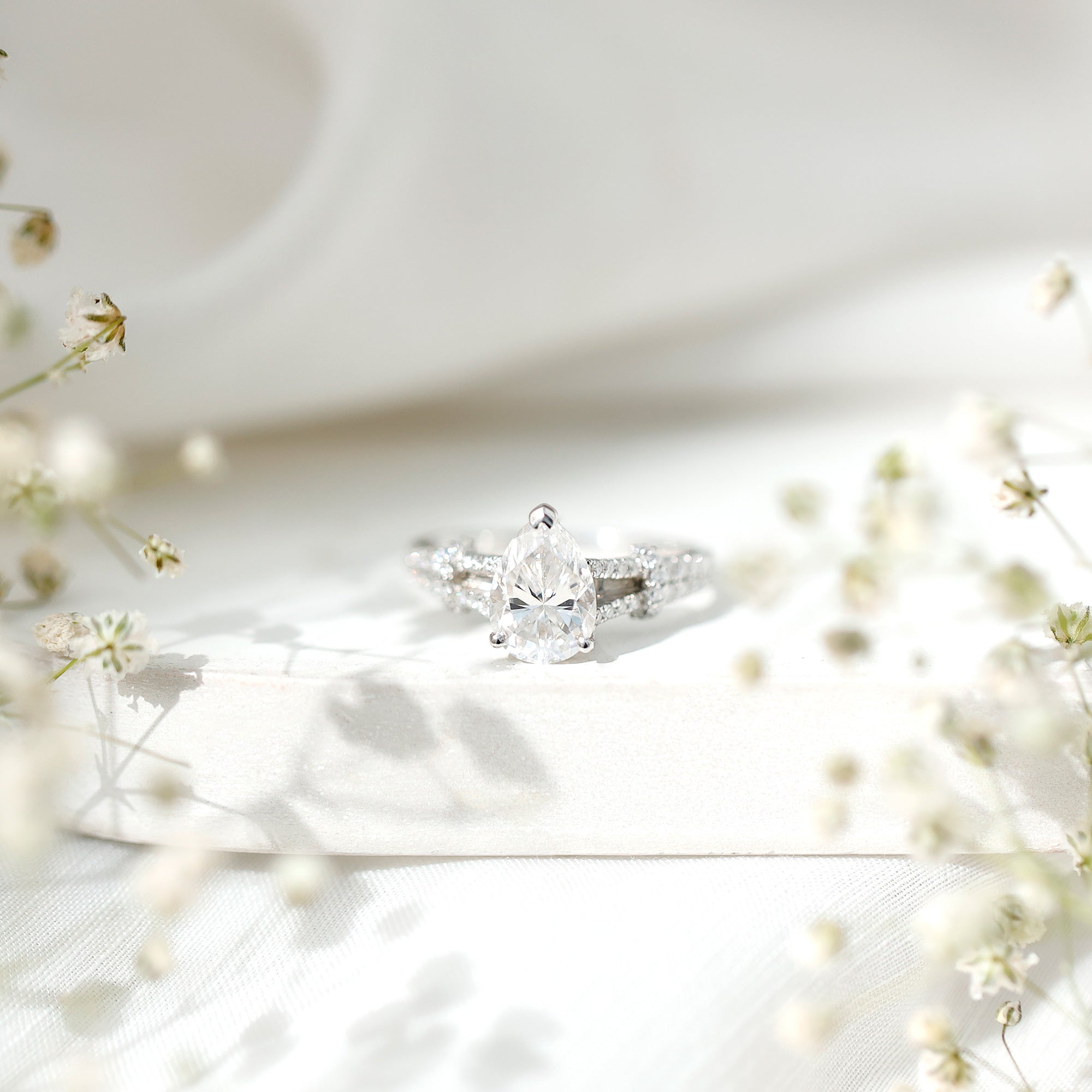 Pear Shaped Moissanite Solitaire Engagement Ring in Split Shank D-VS1 - Rosec Jewels