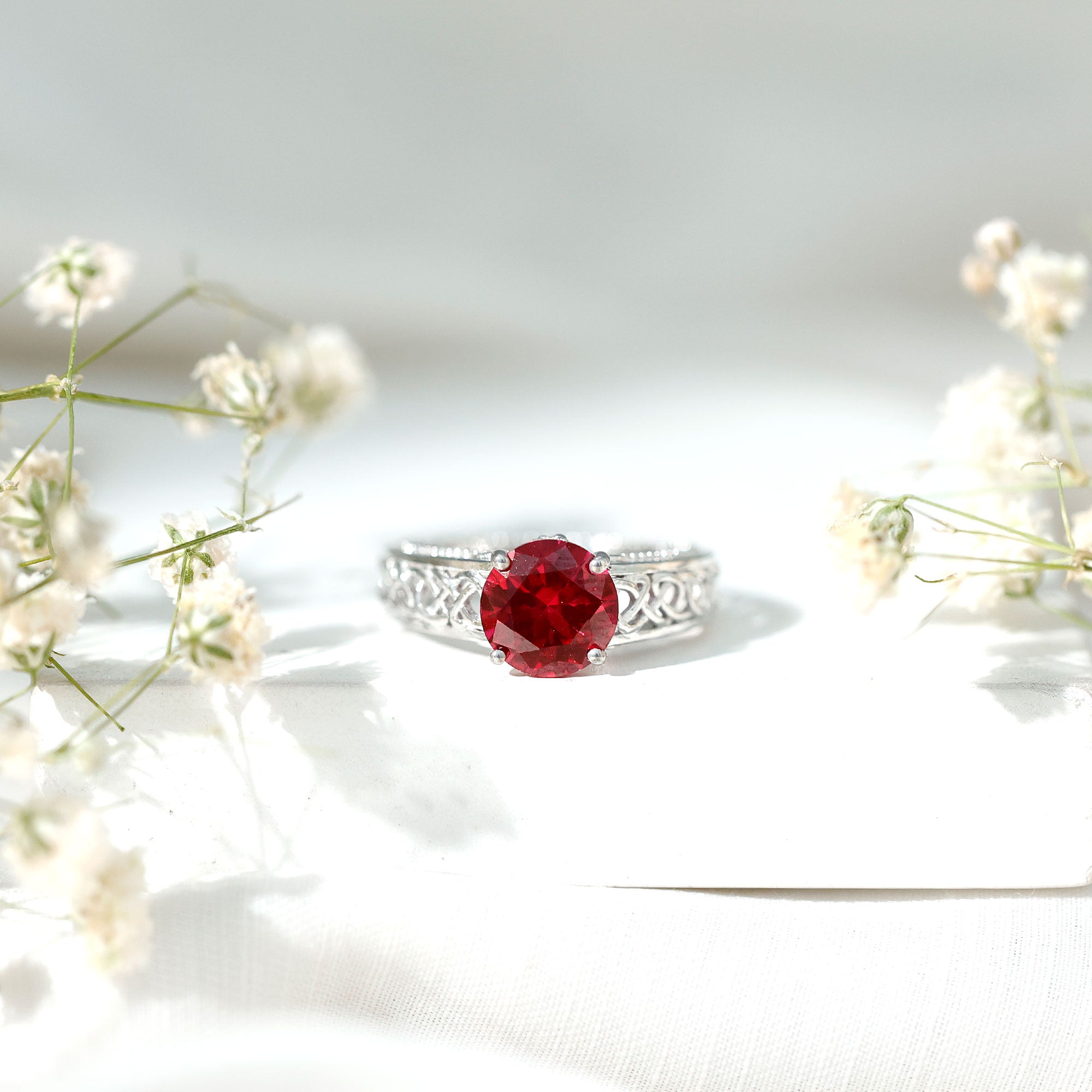Rosec Jewels-Vintage Style Created Ruby Celtic Knot Band Ring with Surprise Diamond