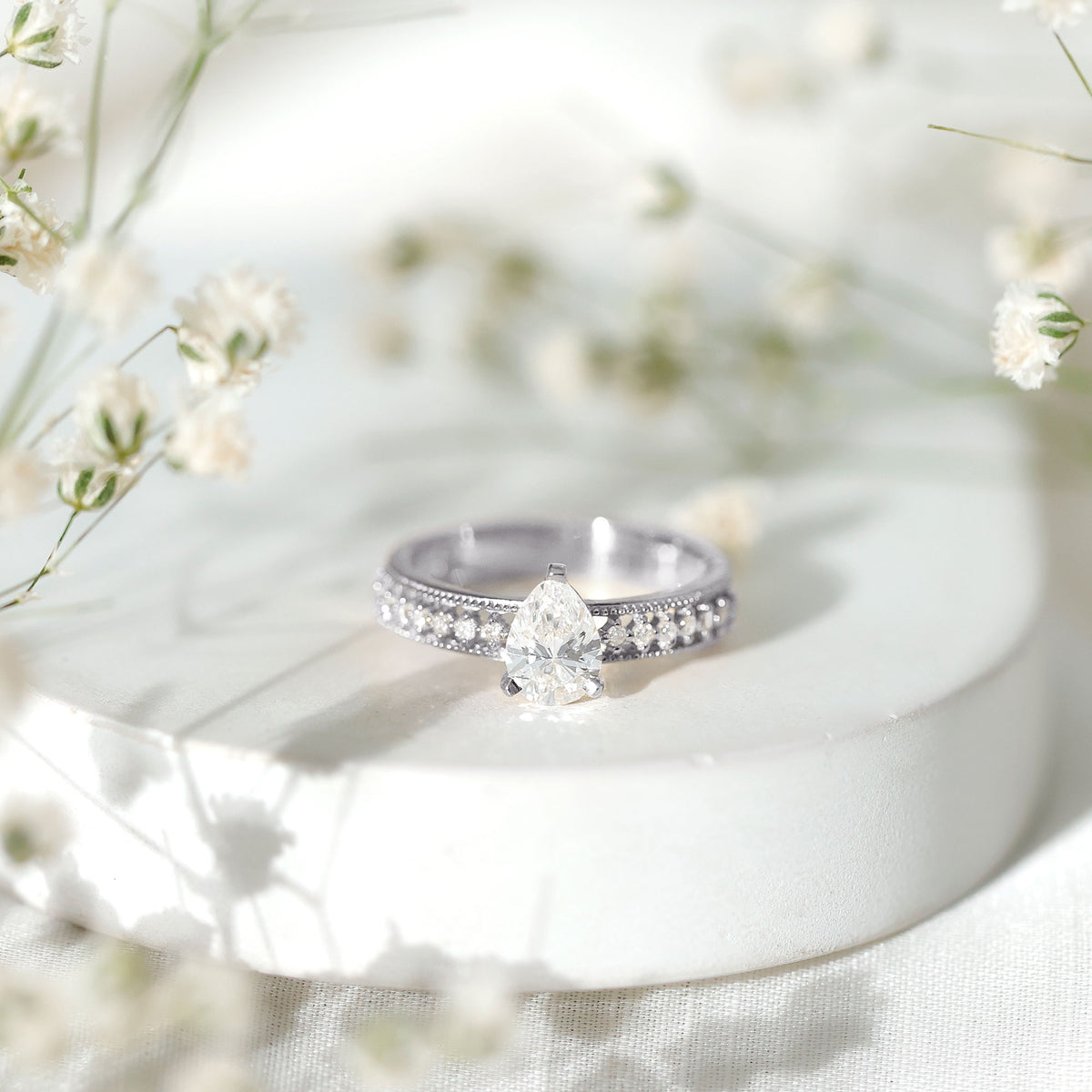 Pear Shaped Moissanite Solitaire Engagement Ring with Beaded Design D-VS1 - Rosec Jewels