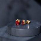 Solitaire 1.5 Carat Pear Shaped Lab Created Ruby Stud Earrings AAAA - Rosec Jewels