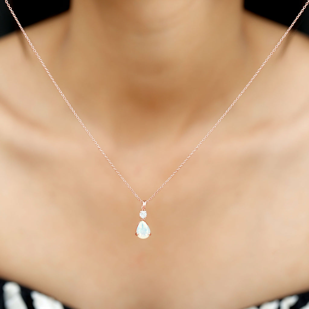 Rosec Jewels-Simple Ethiopian Opal Teardrop Pendant with Moissanite