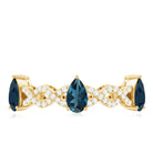Rosec Jewels-Pear Shape London Blue Topaz Crossover Eternity Band with Diamond