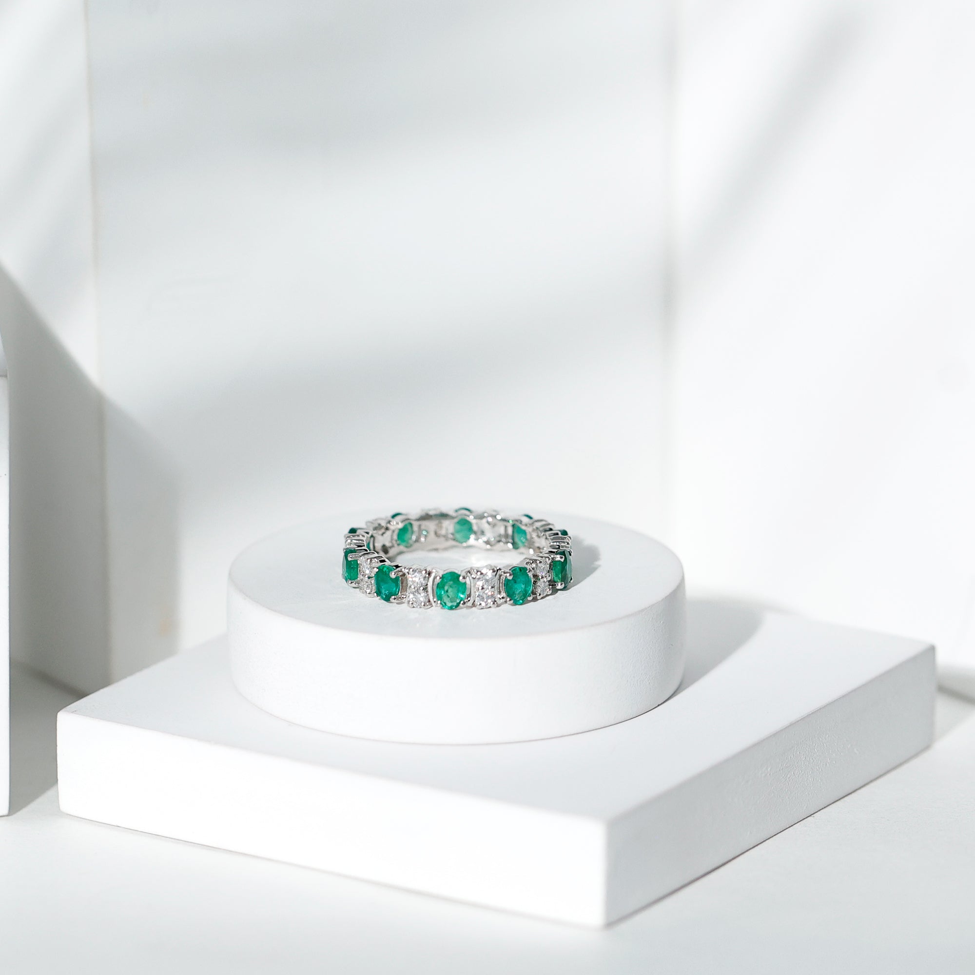 Rosec Jewels-Oval Emerald and Moissanite Eternity Wedding Band