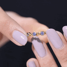 Rosec Jewels-Natural Tanzanite Half Eternity Ring in Bezel Setting
