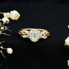 Rosec Jewels-Oval Ethiopian Opal Designer Engagement Ring with Diamond Halo