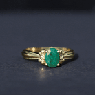 Rosec Jewels-Oval Cut Emerald Solitaire Engagement Ring with Bow Design