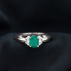 Rosec Jewels-Oval Cut Emerald Solitaire Engagement Ring with Bow Design