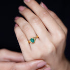 Rosec Jewels-Oval Cut Emerald Solitaire Engagement Ring with Bow Design