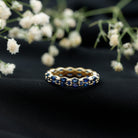 Rosec Jewels-1.5 CT Marquise and Round Blue Sapphire Contemporary Full Eternity Ring