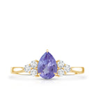 0.8 Carat Pear Shaped Tanzanite Engagement Ring with Diamond Trio AAA - Rosec Jewels