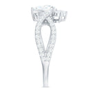 Rosec Jewels-Designer Pear Shaped Moissanite Crossover Engagement Ring