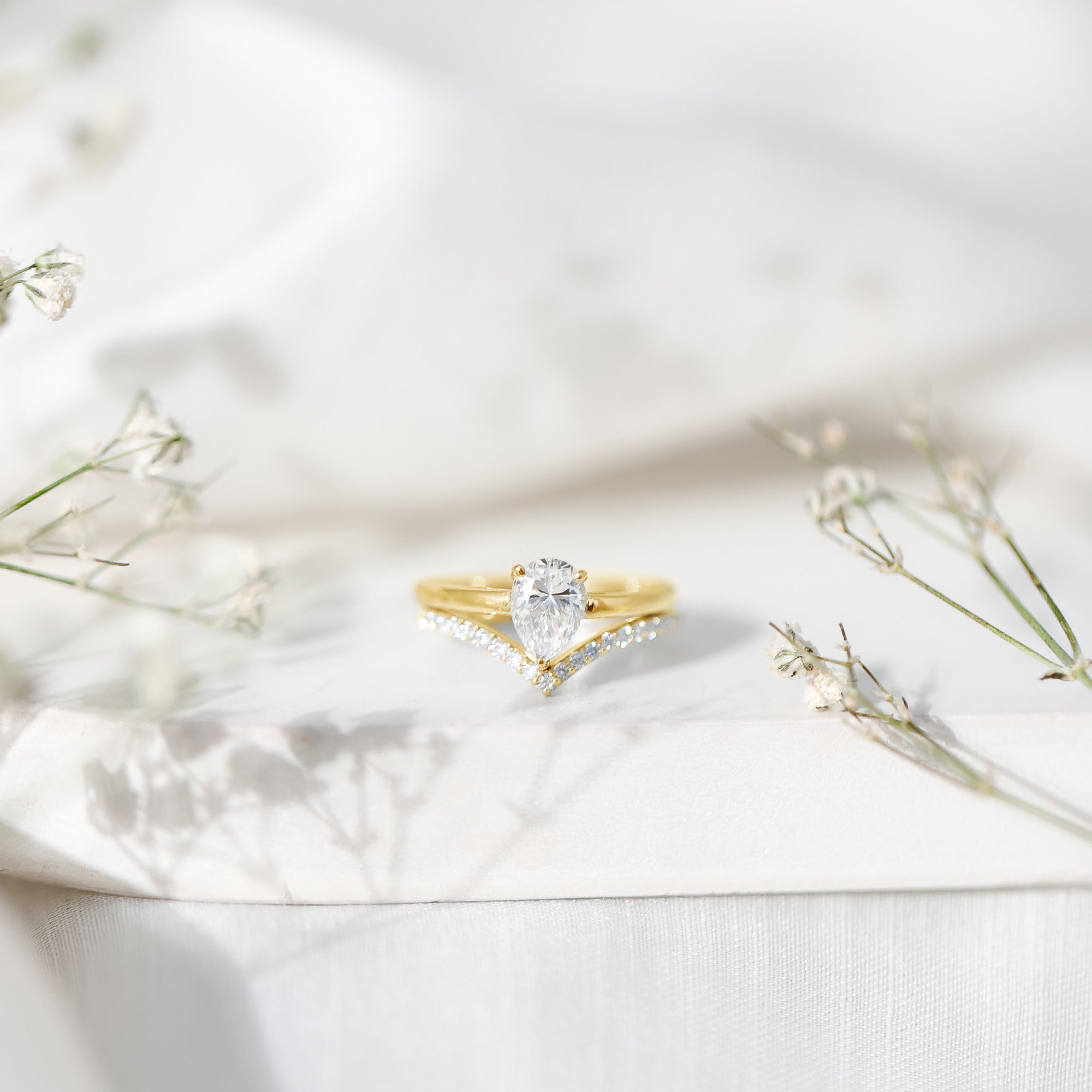 Rosec Jewels-Pear Cut Solitaire Moissanite Engagement Ring with Enhancer