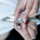 Rosec Jewels-Illusion Set Round Moissanite Crossover Halo Engagement Ring