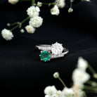 Rosec Jewels-Emerald and Moissanite Two Stone Engagement Ring in Bypass Shank