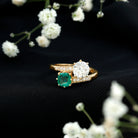 Rosec Jewels-Emerald and Moissanite Two Stone Engagement Ring in Bypass Shank