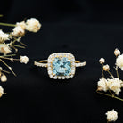 Rosec Jewels-Cushion Cut Sky Blue Topaz and Diamond Halo Engagement Ring